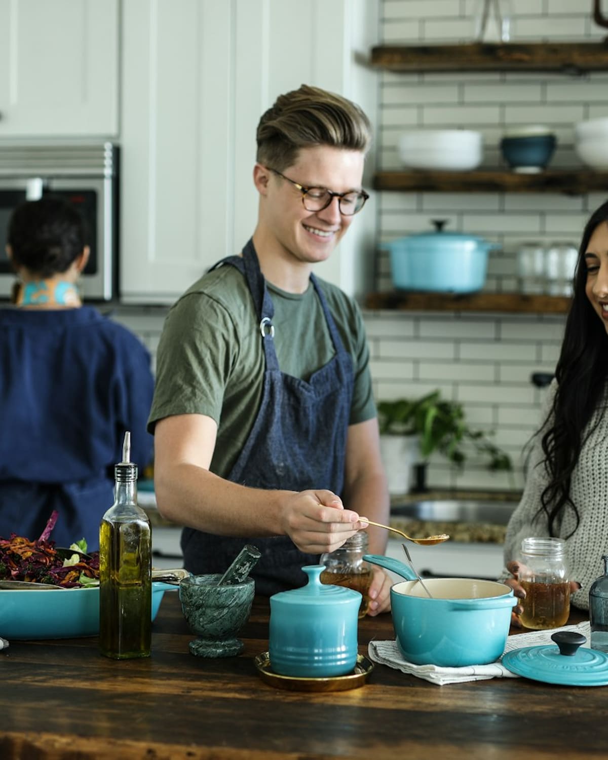 Chef plating food in a kitchen